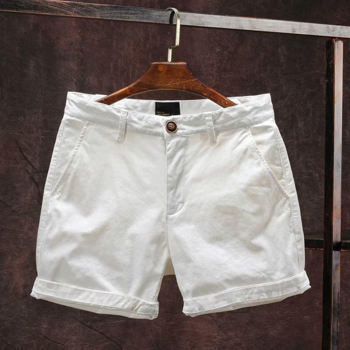 Närmare bild av bekväma sommarshorts herr, med textur som visar ledig och andningsbar tygkvalitet.
