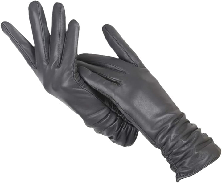 Svarta klassiska handskar för vintern, tidlös modestil för kvinnor. Varma, sköna och eleganta.