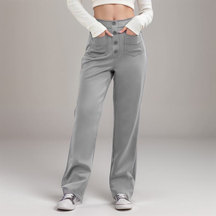 Kvinnliga bekväma stretchbyxor med hög midja och vida ben, i en djupröd färg, fashionabla.