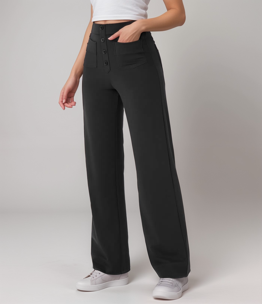 Eleganta dam byxor med hög midja och vida ben, bekväma tack vare stretch, i neutral färg.