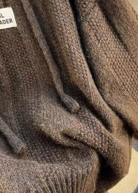 Kvinnors hooded top med långa ärmar och snörning, perfekt för höstens avslappnade outfits. Mjuk och bekväm.