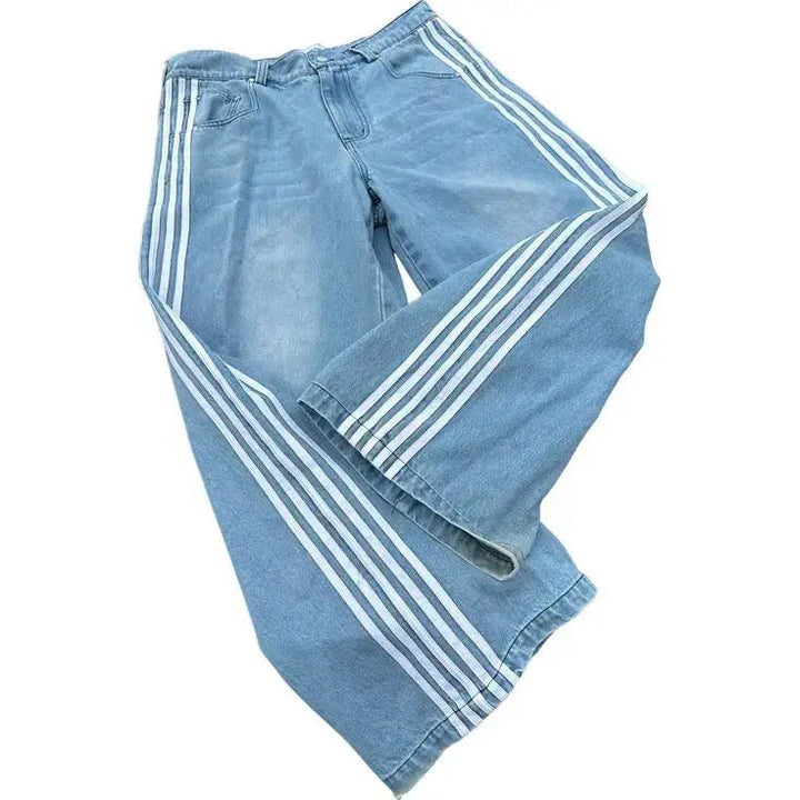 Kvinnors blå baggy jeans, lösa i passformen med hög midja och vita sidränder, inspirerade av Y2K mode