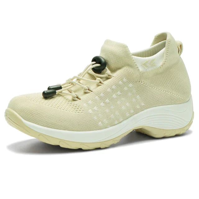 Ortopediska damskor: dämpande sneakers för kvinnor, stöder foten under långvarig användning.