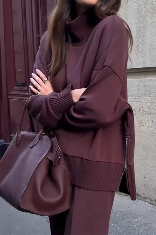 Elegant och mångsidigt dam sweatshirtset i neutral färg, med höghals och vida byxor för en chic casual look.