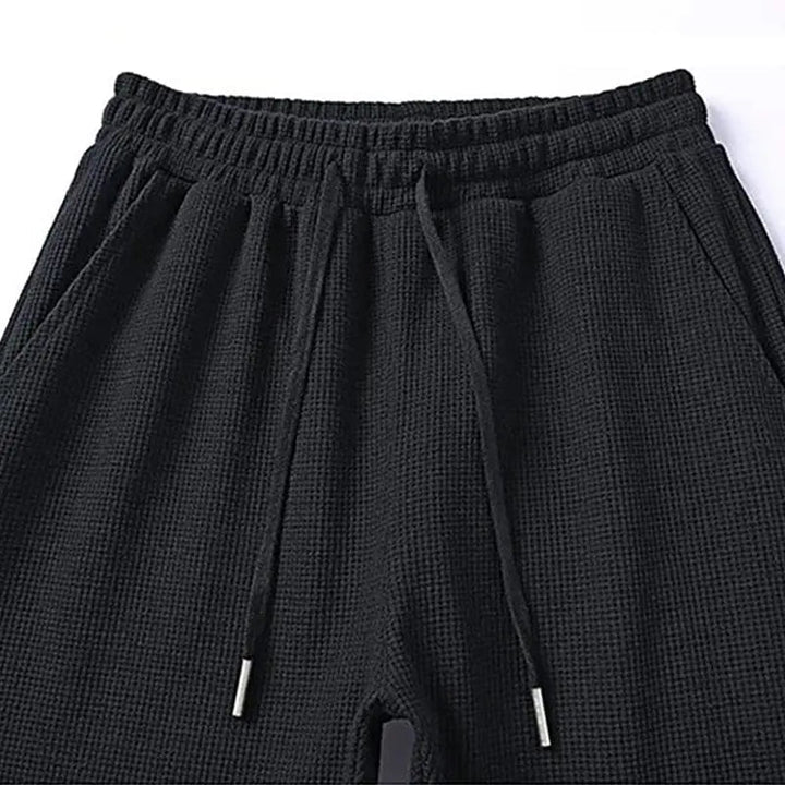 Stilrent och bekvämt våffelstickat loungewear för kvinnor, ett trendigt fritidsset.