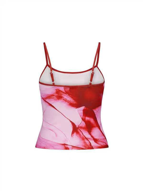 Snygg kvinnors topp: blommig rygglös crop top med smala spagettiband. En modern festtopp för sommarstilen.