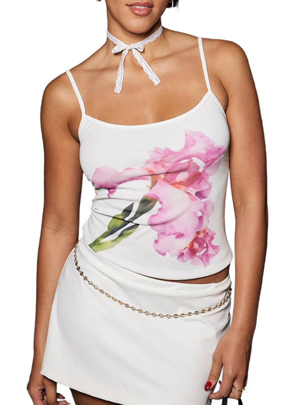 Kvinnors blommiga crop top med spagettiband. Rygglös design för semester, sommar och festliga tillfällen.