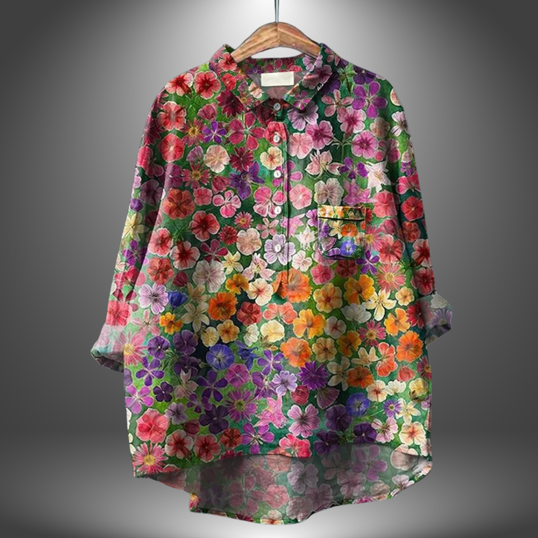 Elegant vårskjorta för kvinnor med blommönster, idealisk för sommarens casual eller festliga tillfällen.