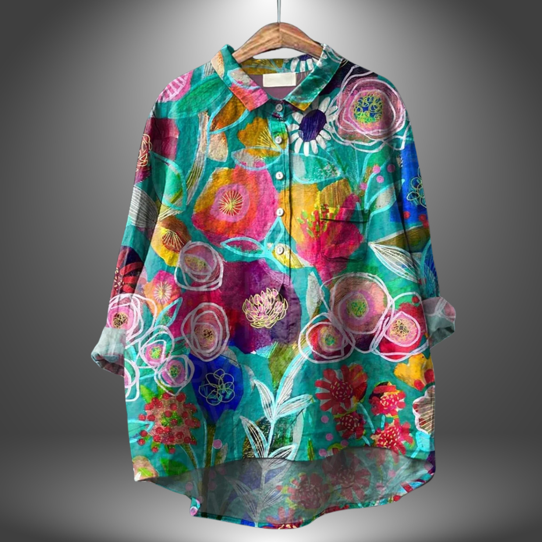 Artisan-inspirerad kvinnors blommig skjorta med unikt mönster, perfekt för en chic och bekväm vardagslook.