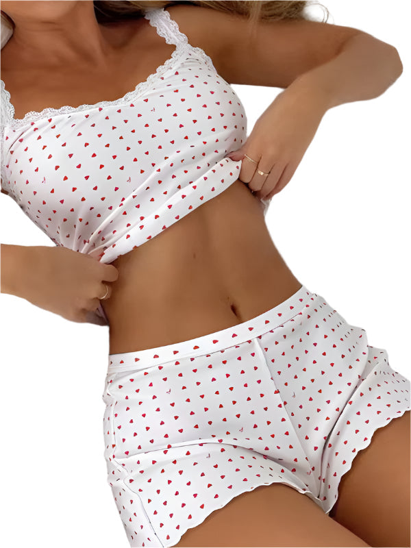 Kvinnors blommiga sömnset med spets, spaghetti strap topp & shorts. Perfekt för sommar & avkoppling.
