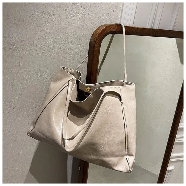 Elegant bucketväska, kvinnors mångsidiga axelväska. Perfekt vardagsväska som accessoar för många stilar.