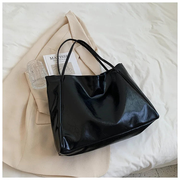 Elegant modeväska med retro-stil. Kvinnors handväska, stilren bucketväska som axelväska.