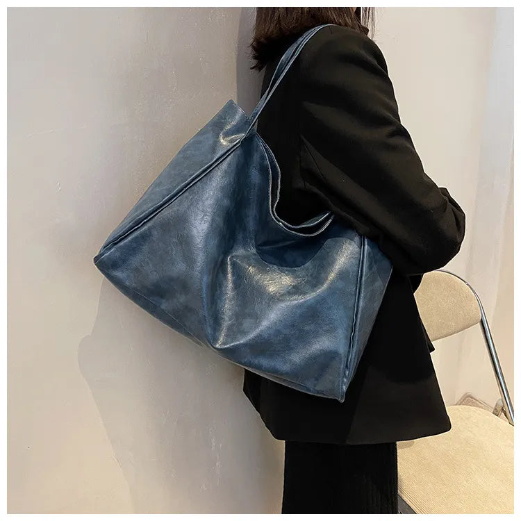 Unik retro-stil bucketväska för kvinnor. Elegant axelväska, mångsidig handväska för vardagen.