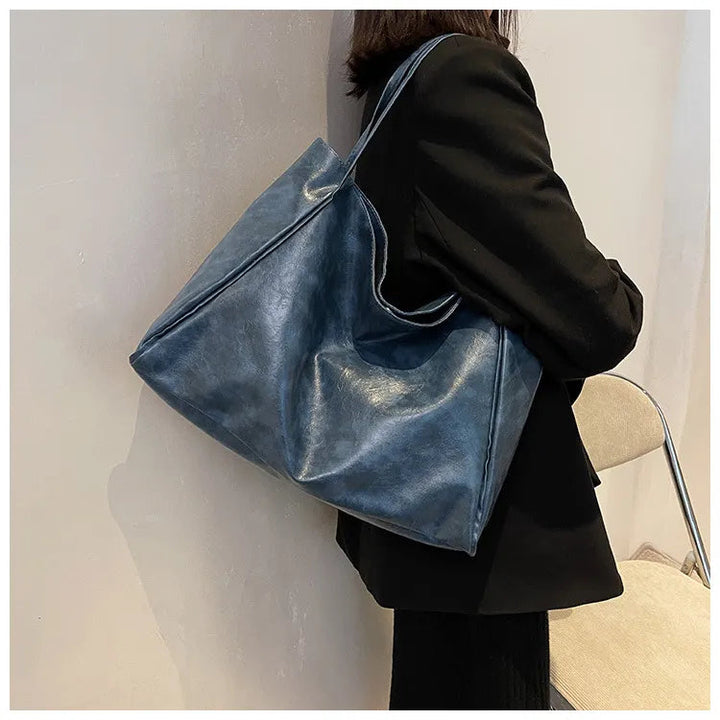 Unik retro-stil bucketväska för kvinnor. Elegant axelväska, mångsidig handväska för vardagen.