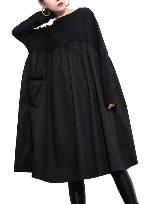 Kvinnors elegant klänning med hög midja och unikt patchworkmönster. Perfekt för fest och vardag.