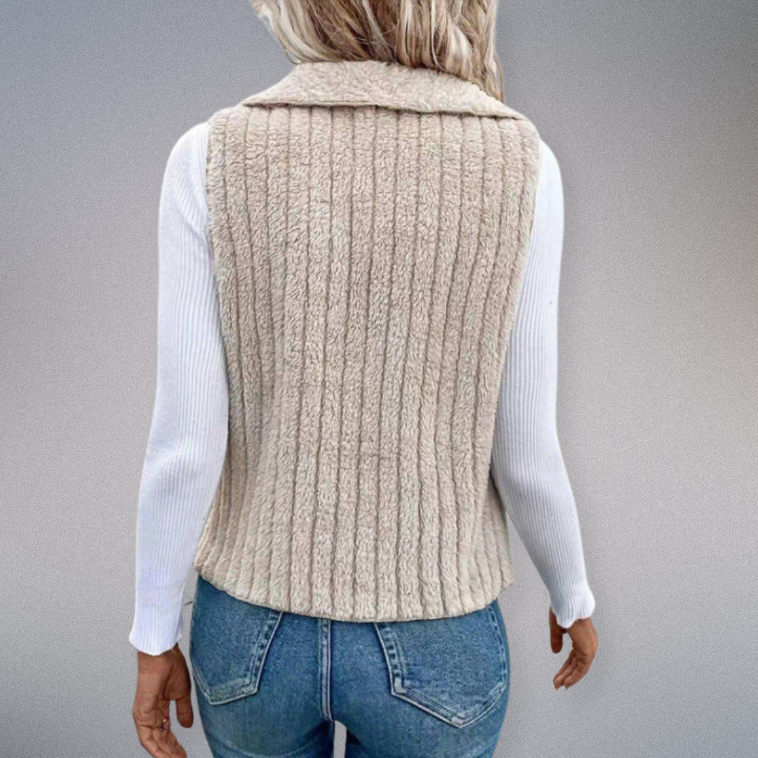 Högkvalitativ enfärgad cardigan för kvinnor med skärd krage. Bekväm för både vardag och speciella tillfällen.