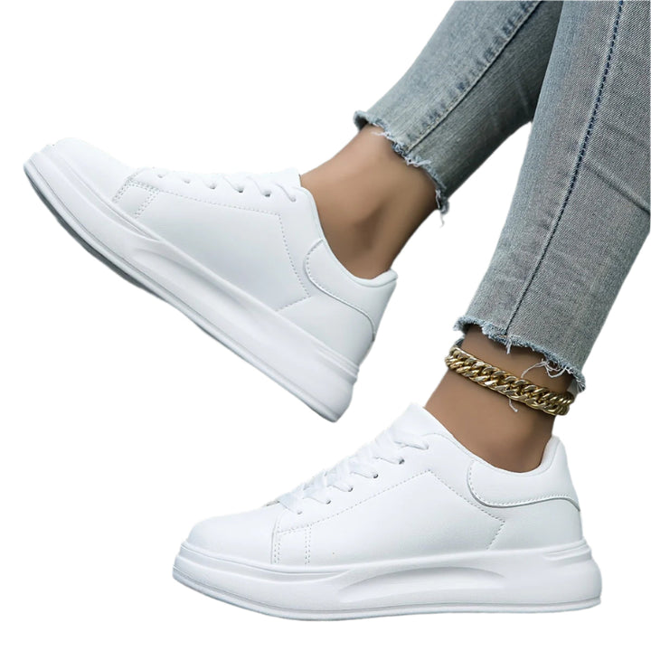 Kvinnors ergonomiska sneakers för optimal komfort, med stödjande sula, perfekta för vardag och promenader.