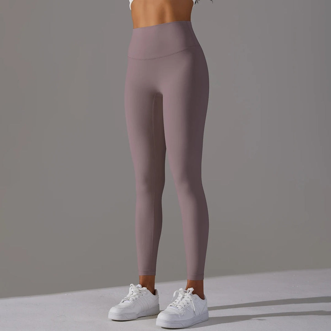 Kvinnors yoga leggings med hög midja i mjukt, stretchigt material.