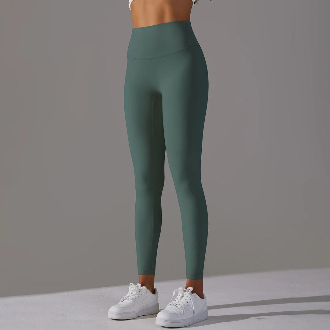 Damleggings med stretch och hög midja, perfekta gymkläder för en aktiv kvinna.