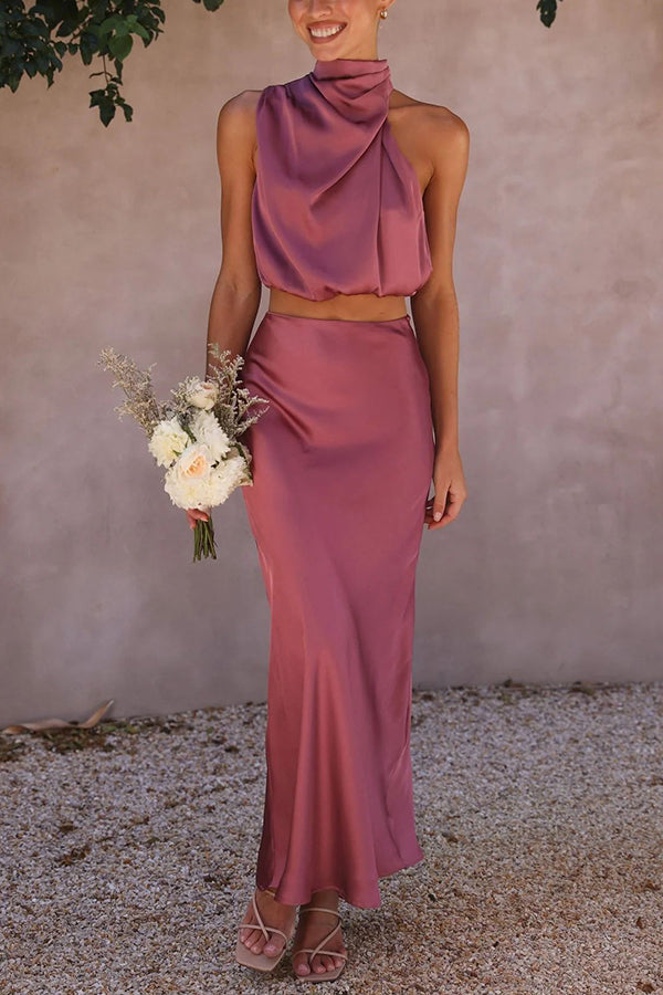 Kvinnomode maxirock: Flödande, elegant tvådelad outfit för fest och avslappnad elegans.