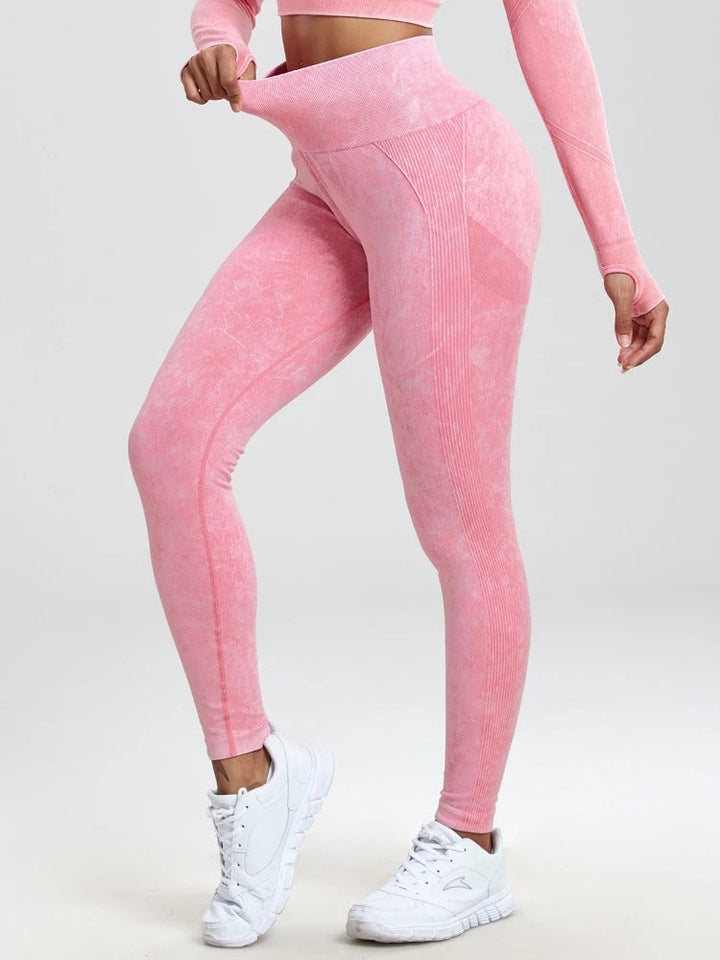 Damkläder: Högmidjade fitness leggings med rumplyft. Bekväma och funktionella för alla träningsformer.