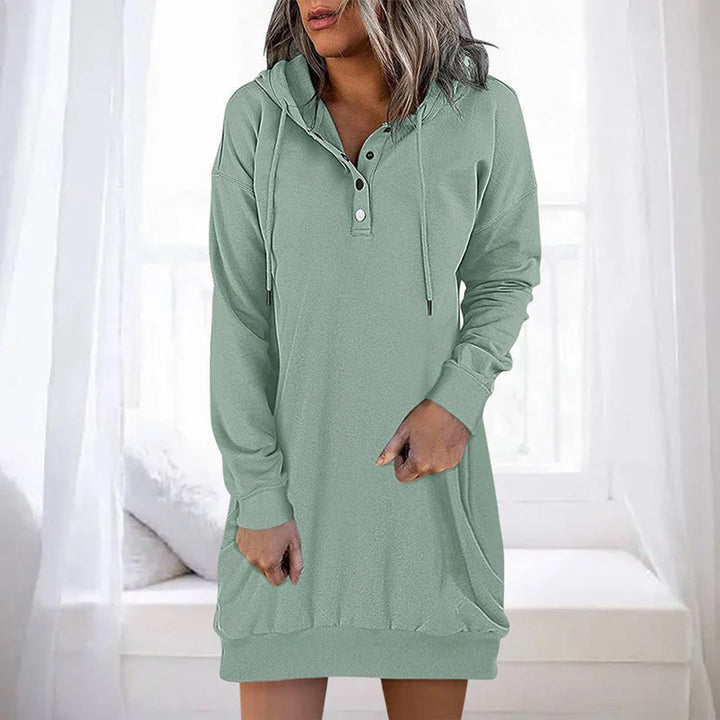 Stilren avslappnad klänning, kvinnlig hoodieklänning som kombinerar komfort och modern vardagsstil.