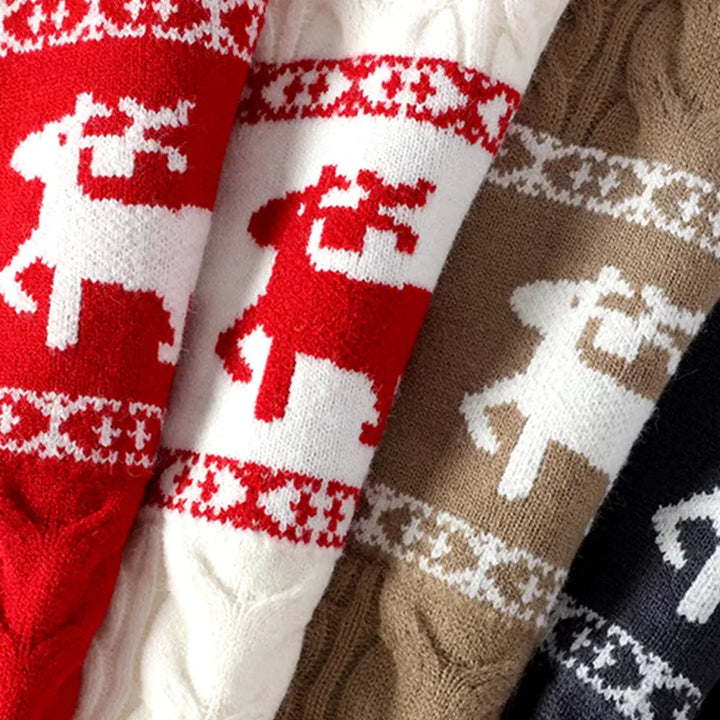 Festlig damtröja med rundhals och sött renmotiv. Avslappnad passform för en mysig jul.