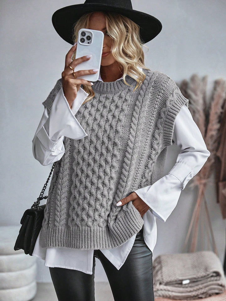 Mångsidig damväst, kabelstickad sweater vest. Höjer din vardagslook med chic detalj.