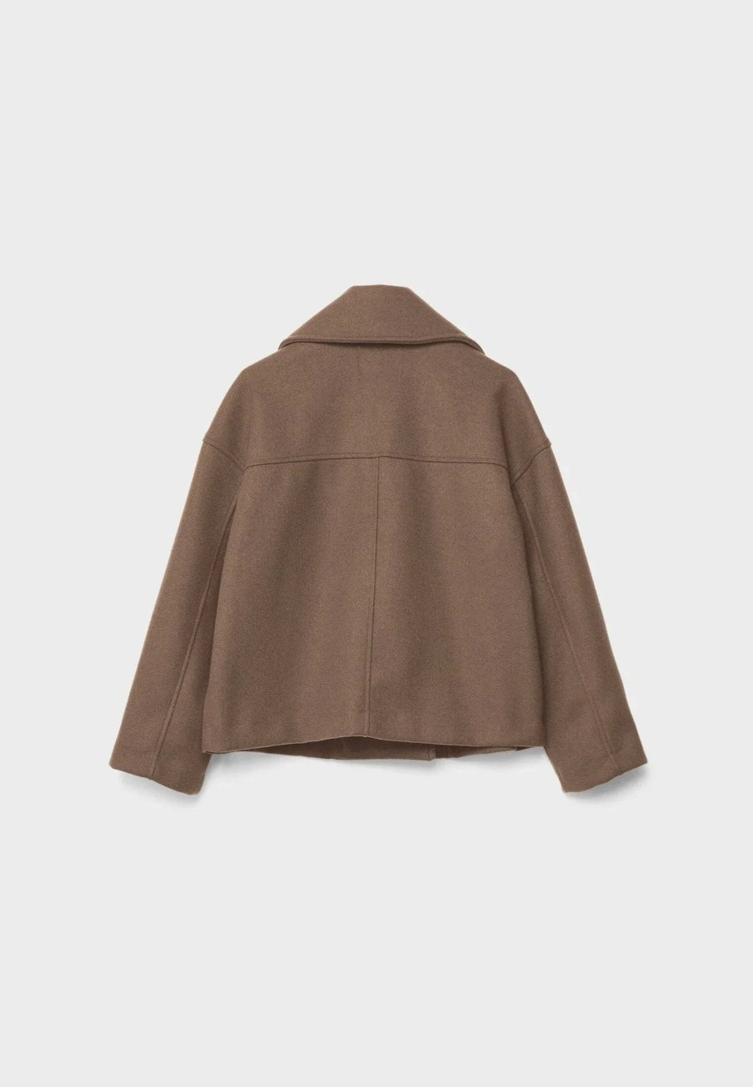 Damkavaj i kort, dubbelknäppt modell, ett stilrent ytterplagg för den modeintresserade.