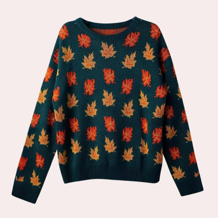 Gul och grön långärmad damtröja med stickat bladmönster. En bekväm rundhalsad tröja för höstmode.