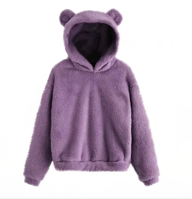 Perfekt present: Mysig kvinnors hoodie med kaninöron. En varm och lekfull tröja för dam.