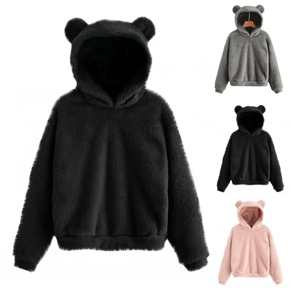 Mjuk vinterhoodie för kvinnor. Denna varma tröja med kaninöron är perfekt för kalla dagar.
