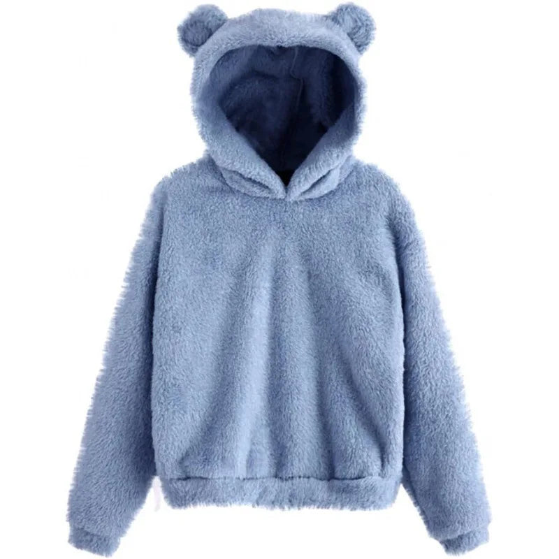 Stilren kvinnors hoodie med kaninöron. Mjuk, varm och perfekt för en avslappnad höststil.