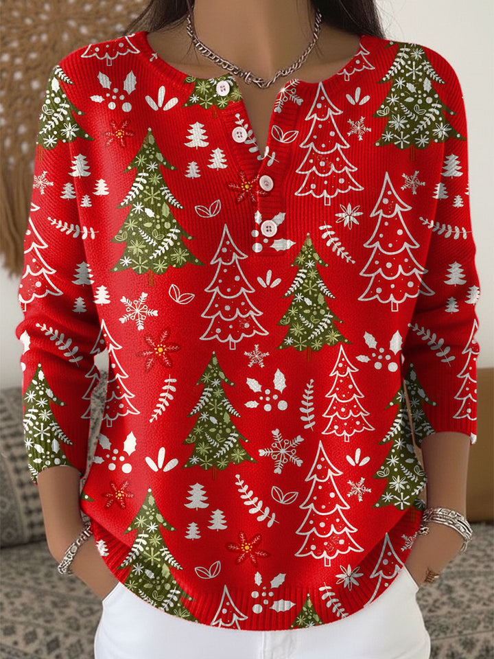 Festlig kvinnors jultröja med dekorativa knappar, mysig stickning och julmotiv för vinterkläder.