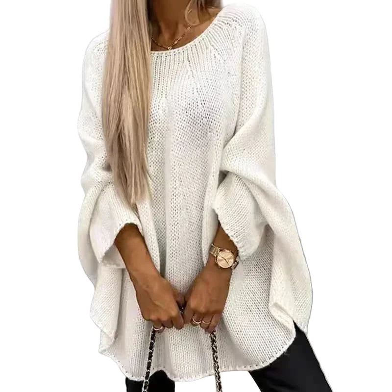 Kvinnors oversized cape-tröja med batwing-ärmar i mjukt tyg. Perfekt för bekväm höst- & vinterstil.