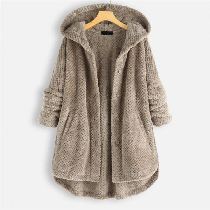 Mångsidig oversized damjacka med huva, passar för höstmode och avslappnad vinterstil.