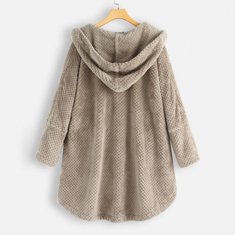 Bekväm oversized jacka med huva för dam, ett mysigt ytterplagg för höst- och vinterdagar.