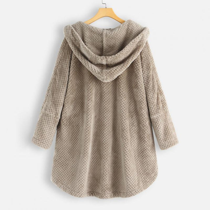 Bekväm oversized jacka med huva för dam, ett mysigt ytterplagg för höst- och vinterdagar.
