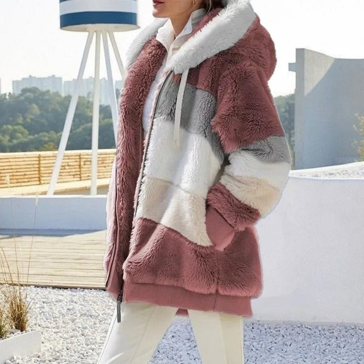 Mysig oversized vinterjacka för kvinnor, med bekväm huva och avslappnad look.