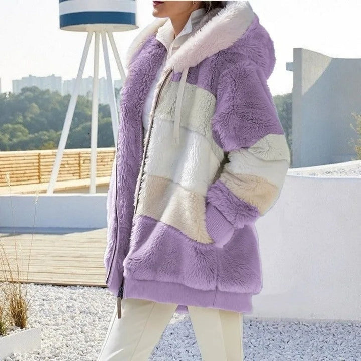 Varmt ytterplagg: kvinnors oversized huvjacka med djupa fickor, perfekt för kyla.