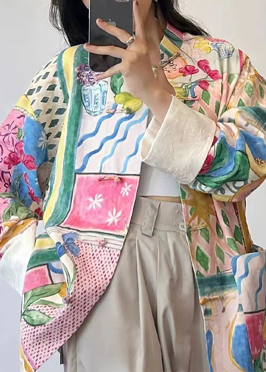 Färgglad patchworktopp för kvinnor med praktiska fickor, bekväm och modern design för höstens mode.