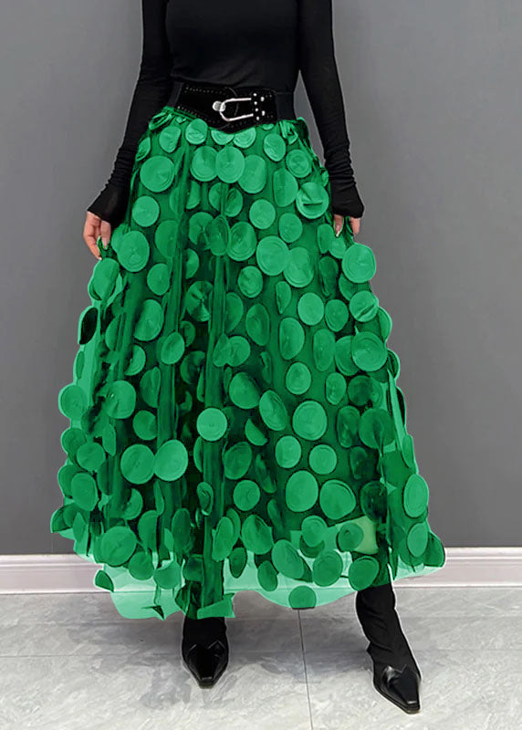 Trendig voluminös tyllkjol med prickar, perfekt för att skapa en festlig eller bohemisk stil.