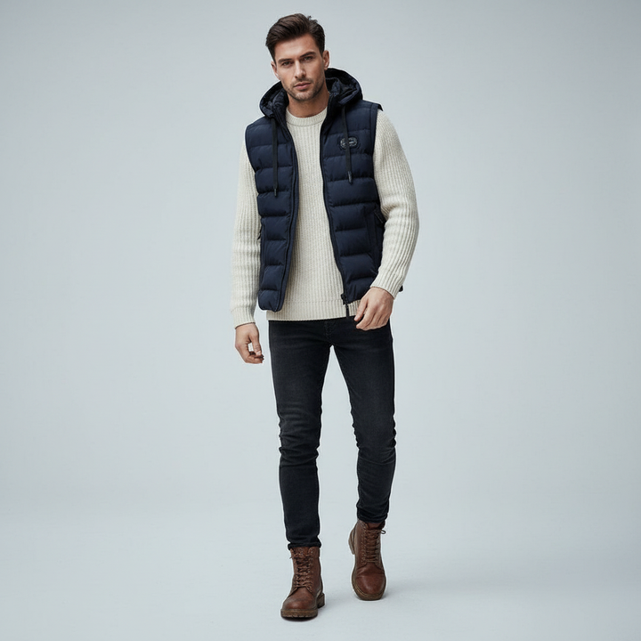 Mångsidig kvinnors quiltad vinterväst med huva. Praktisk damväst för utomhusaktiviteter och höstmode.