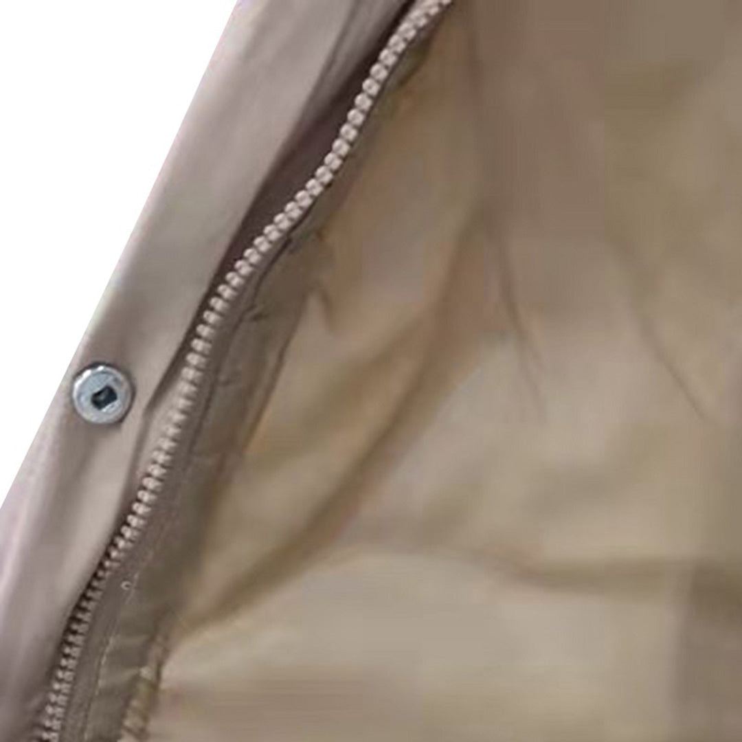 Kvinnlig huvjacka, ärmlös design, skyddar mot kyla med stil.