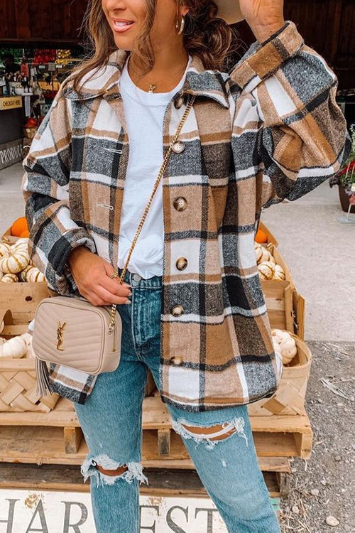 Bekväm rutig skjortarock för kvinnor. Stilren dammode med droppande axel för casual vardagslook.