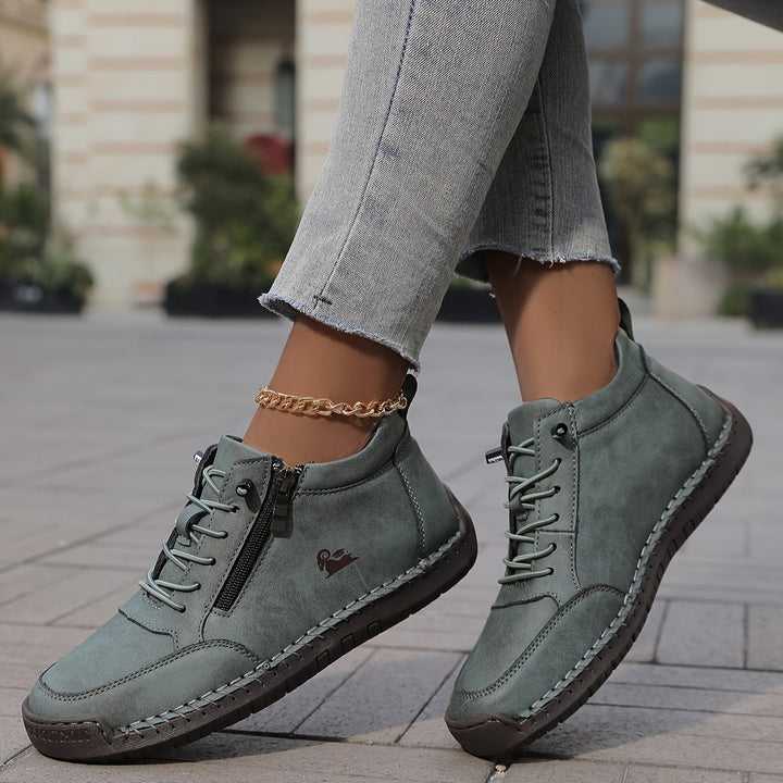 Bekväma kvinnors sneakers med dragkedja, idealiska för långa promenader och vardagsbruk. Flexibel passform.