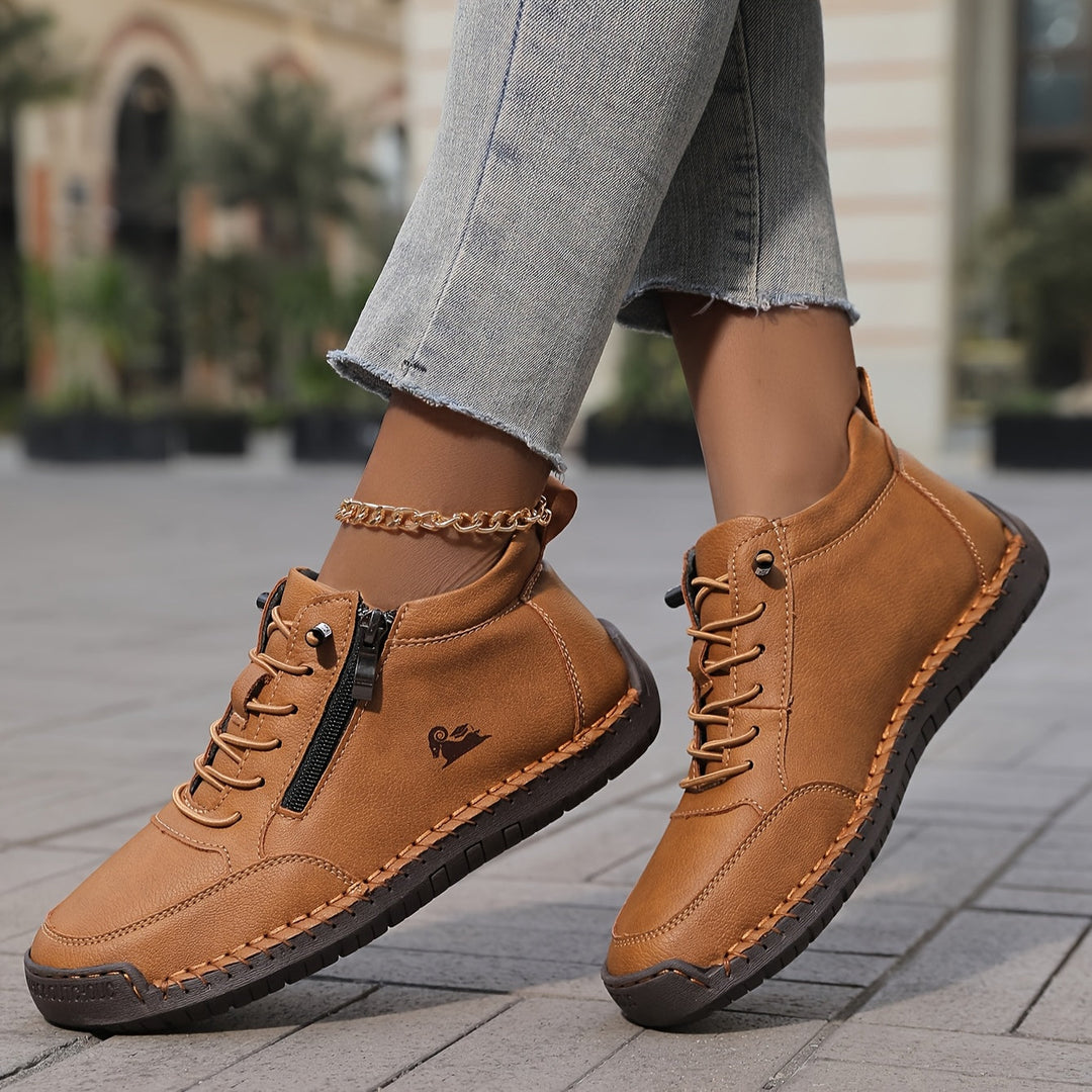 Vår- och sommarsneakers för kvinnor med dragkedja. Lättviktiga och bekväma för varma dagar.