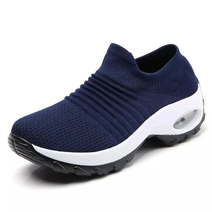 Flexibla kvinnors sneakers med luftkudde och tjock sula, idealiska för träning och våren.