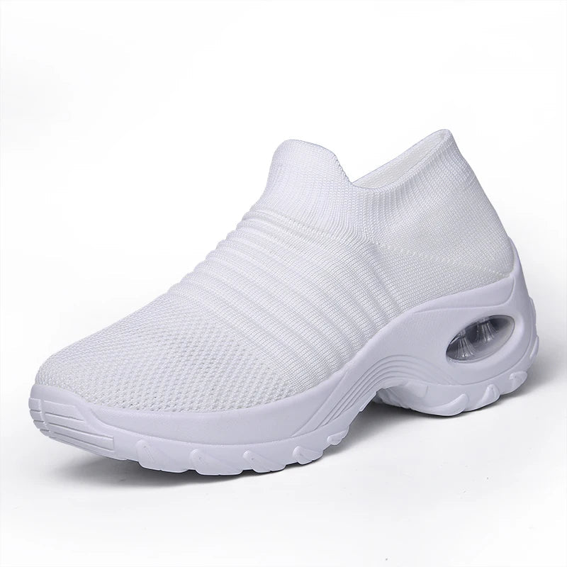 Sportiga dam sneakers med stötdämpande luftkudde och tjock, bekväm sula.