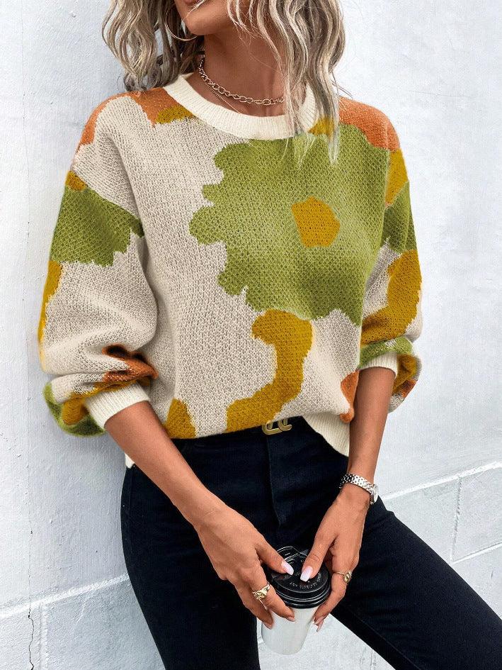 Kvinnors stickad tröja i avslappnad passform med ballongärmar, perfekt för en bekväm och chic vardagslook.